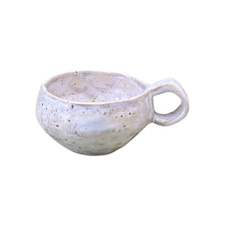 Flad diamant kop med hank I farven lys gul set forfra 