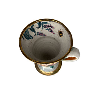 Krus med engel og sommerfugl