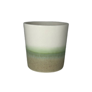 Nils Møller mellem kop i grøn farve