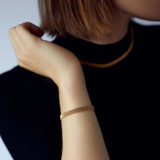 Eden armbånd guld fra Grundled